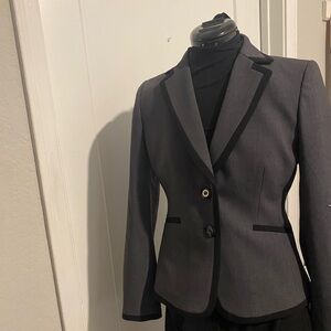 Beautiful Tahari suit. Worn a couple times, basically new.